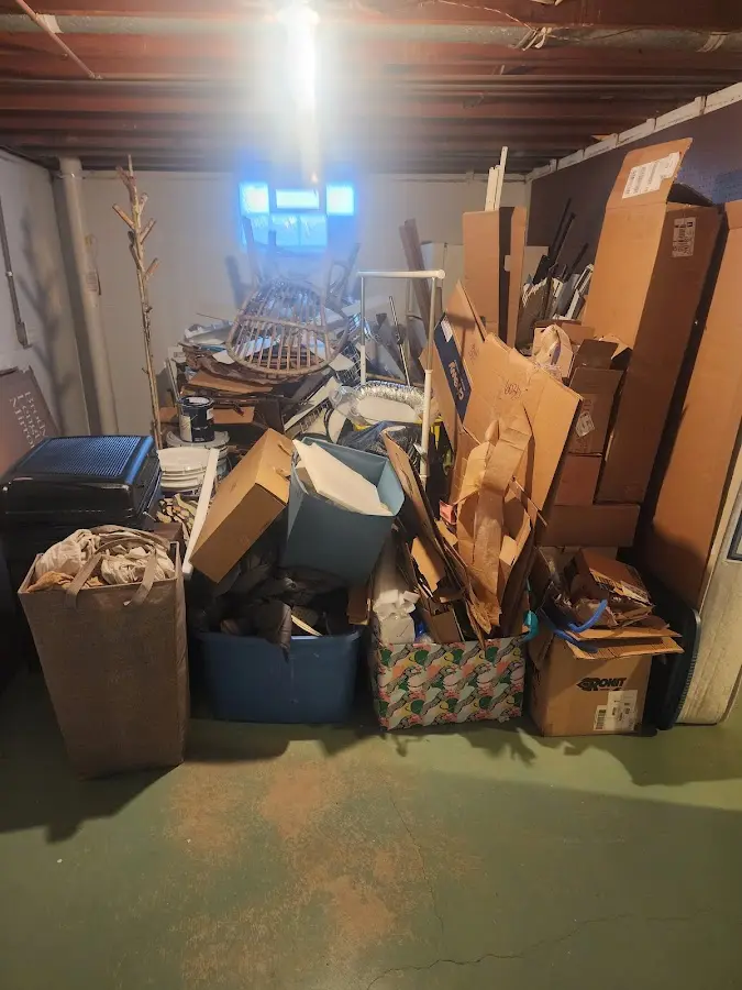 Roll-off dumpster container at job site for Concrete Dumpster Rental in Providence